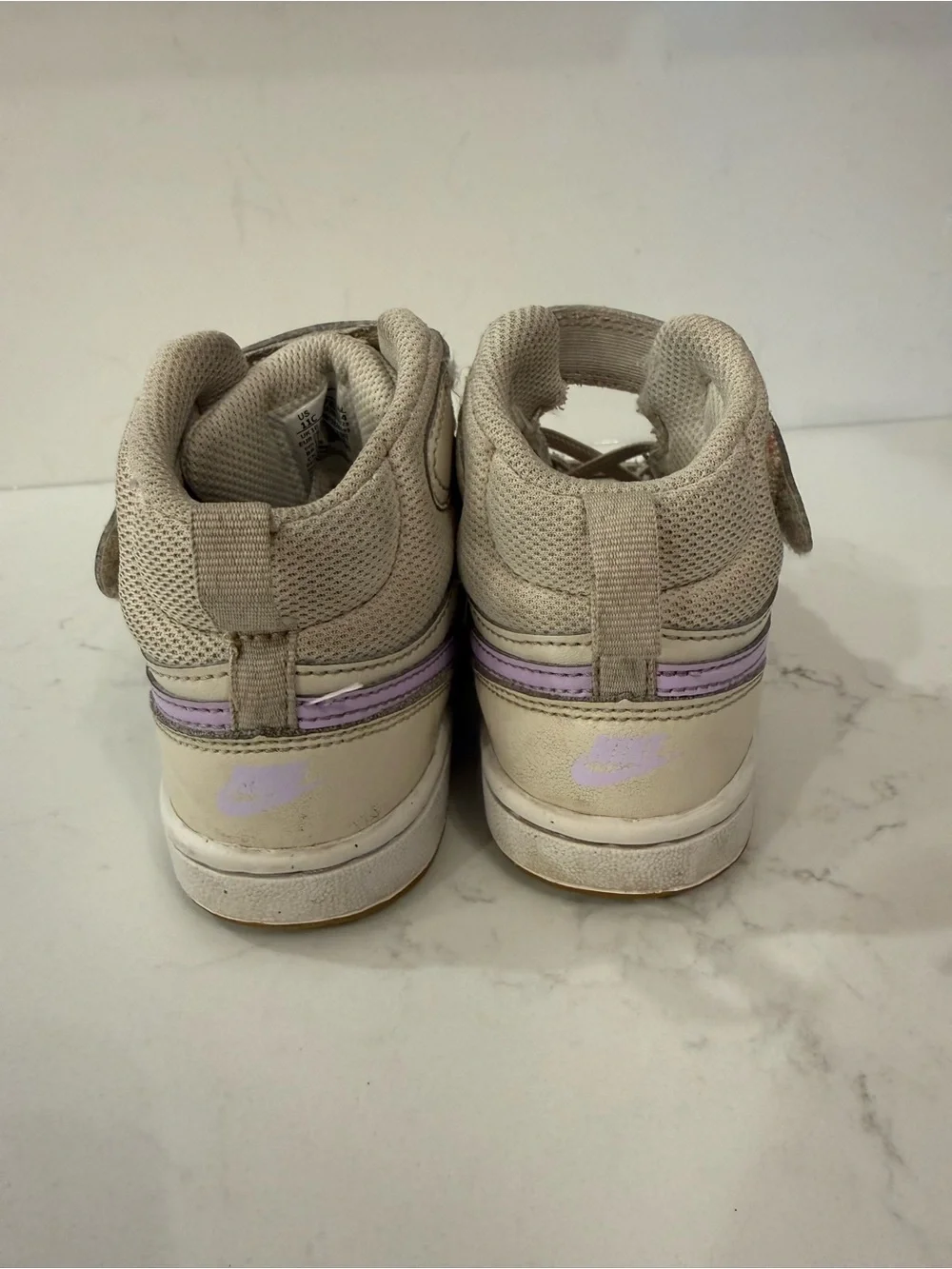 Nike Kids' High-Top Sneakers in White with Lavender Swoosh